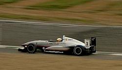 lewis hamilton at bottom of paddock hill 2.jpg