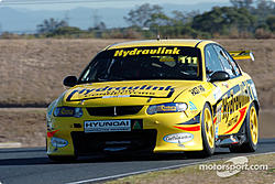 v8supercars-konica-minolta-v8-supercar-eastern-creek-2004-mark-porter-approaches-the-dipp.jpg